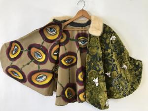 The Courage Cape, Hearts and Minds Cape - Inside - acrylic on silk, embroidery floss on brocade, mink, fired clay, waist length - 2007