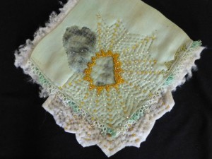 71.Strong-Hankie_8.25-in-x-8.5-in_laser-print_acrylic_glass-beads_thread_embroidery-floss_batting-on-vintage-linen-hankie_2.24.2015